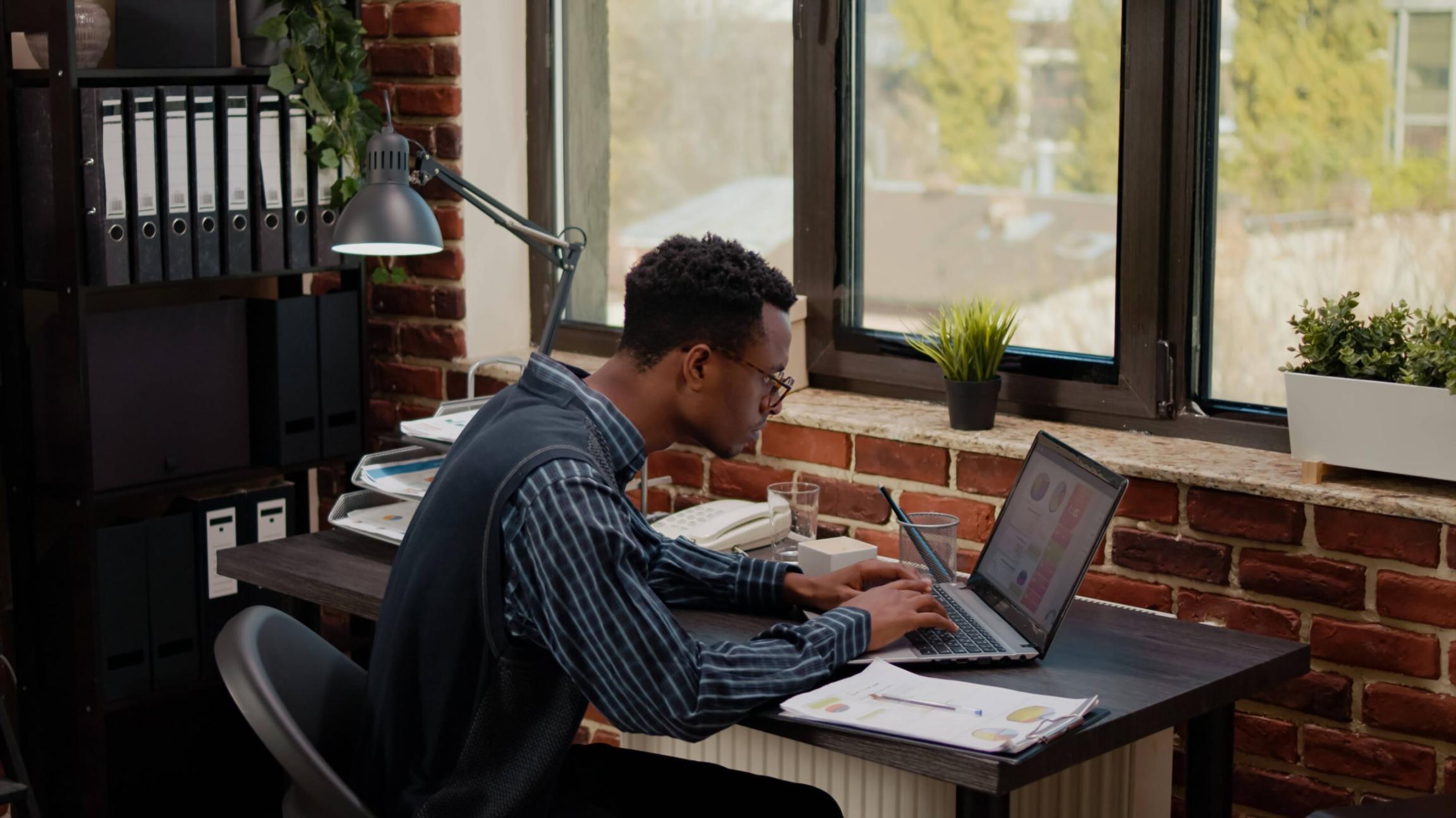 Participant studying a cash flow plan on screen